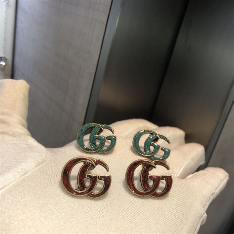 gucci replica earrings|Gucci earrings interlocking.